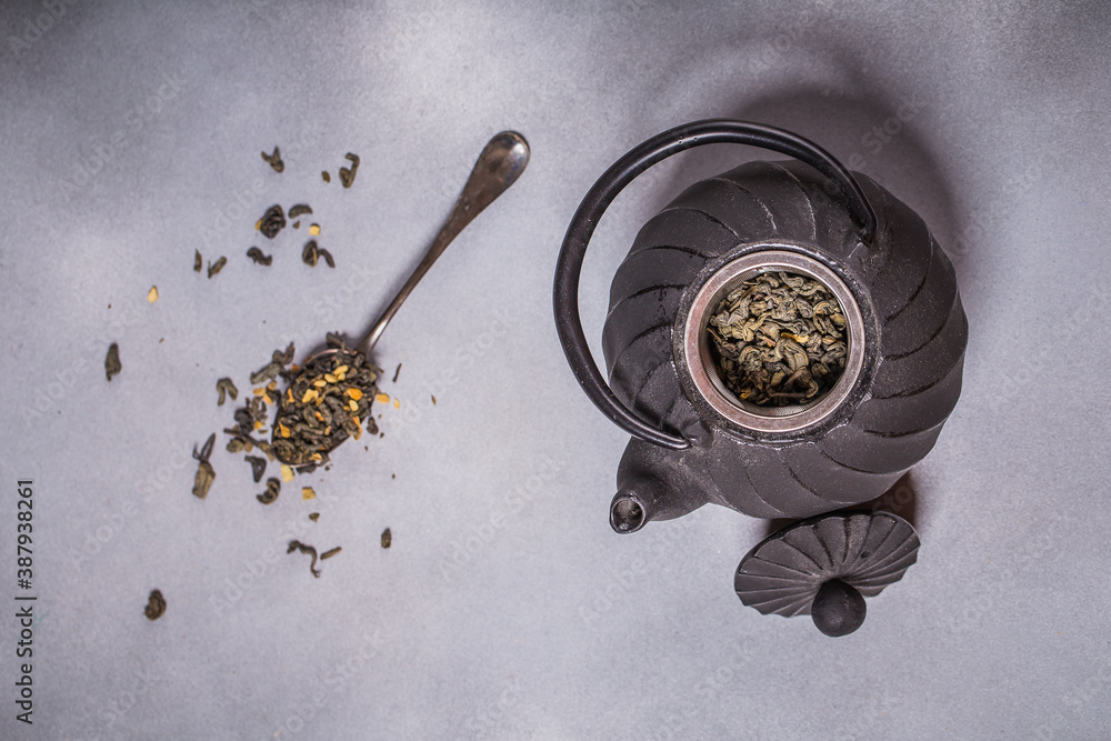 Green tea in iron pot