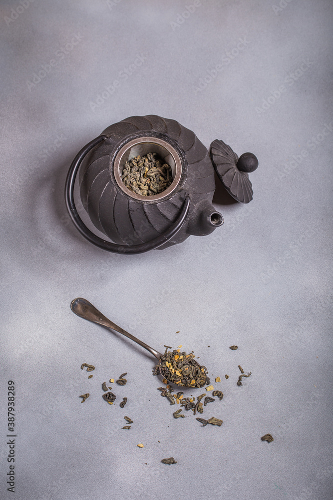 Green tea in iron pot