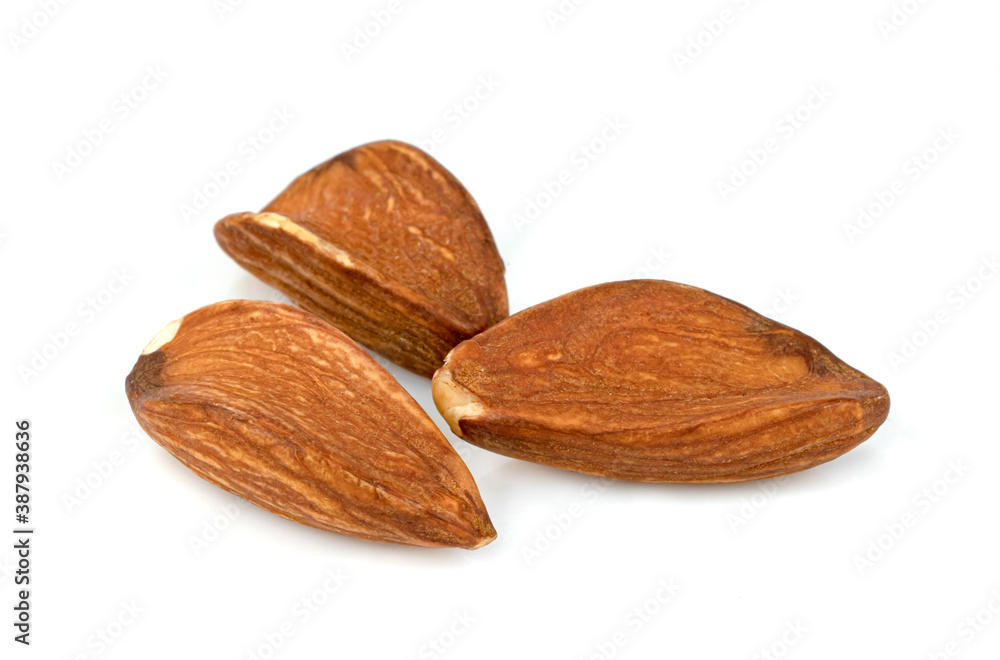 almonds natural roasted isolated on white background almonds natural roasted isolated on white background