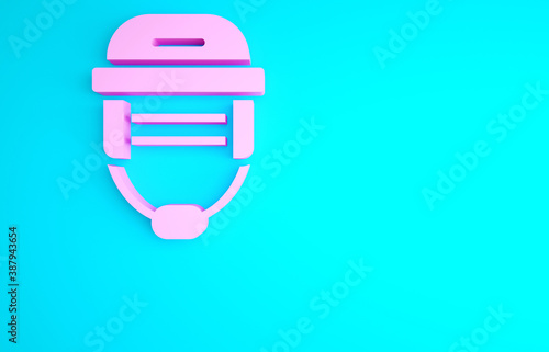 Canvas Print Pink Hockey helmet icon isolated on blue background