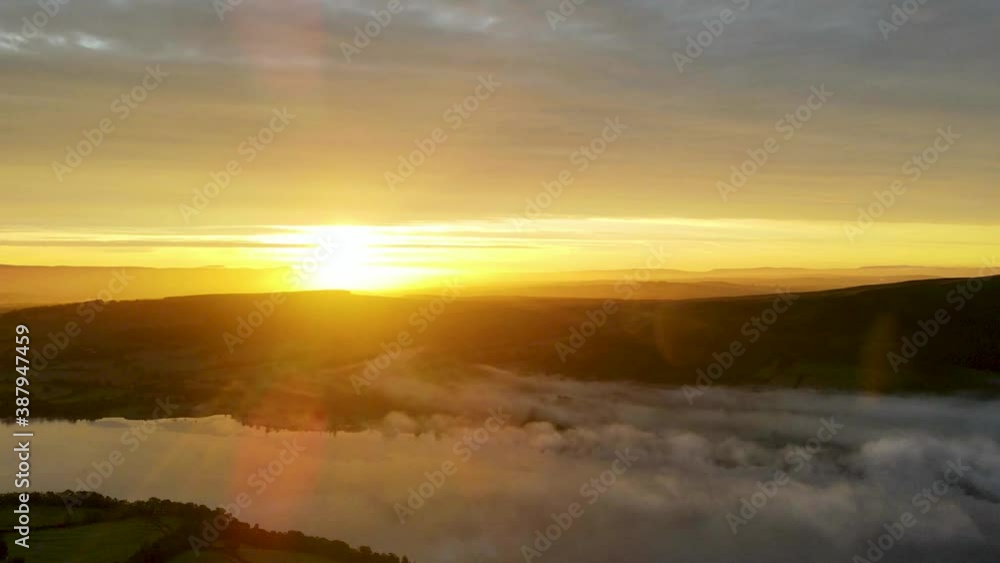 Sunrise over cloud inversion on Ullswater lake, aerial time lapse Sunrise over cloud inversion on Ullswater lake, aerial time lapse