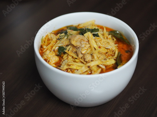 Red Curry with Chicken and Bamboo Shoots in white bowl, Thai food
