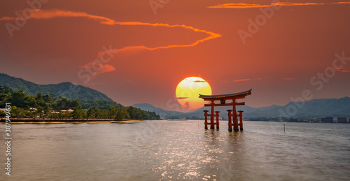 Spectacular composition of Miyajima Torii and sun