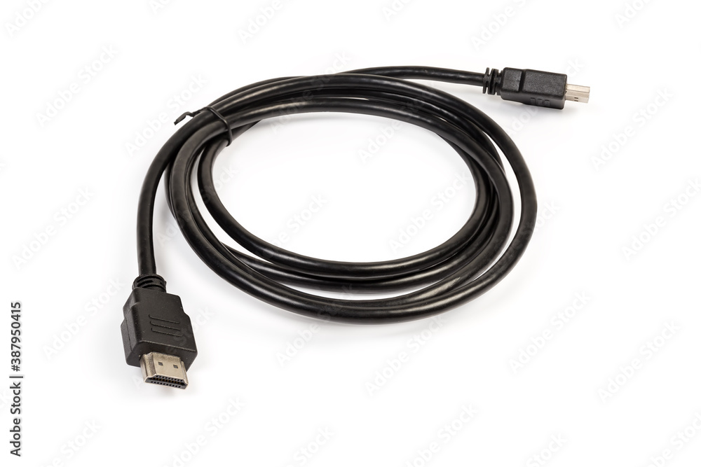 Standard HDMI cable with full-size connectors on white background Standard HDMI cable with full-size connectors on white background