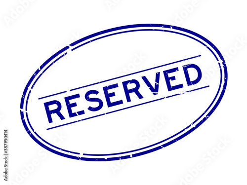 Grunge blue reserved word oval rubber seal stamp on white background