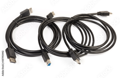 Cables of different multimedia and computers interfaces on white background