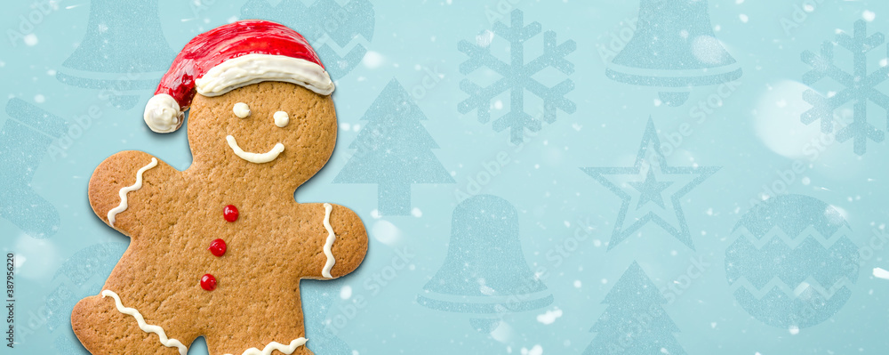 Christmas background with a gingerbread man and copy space Christmas background with a gingerbread man and copy space