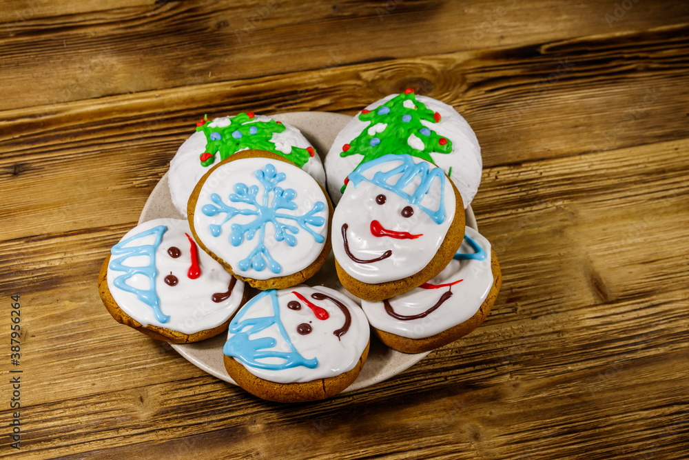 Christmas gingerbread cookies on a wooden background Christmas gingerbread cookies on a wooden background