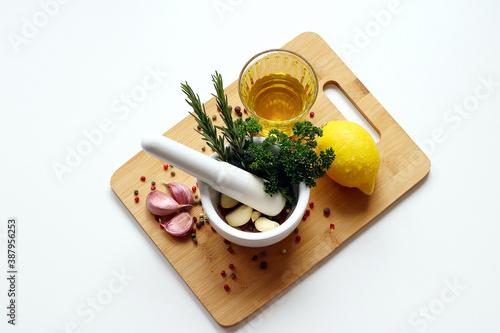 mortar filled with fresh herbs