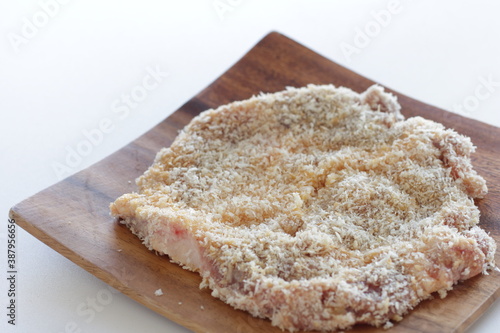 breadcrumbs and pork for Milano cutlet prepared for cooking