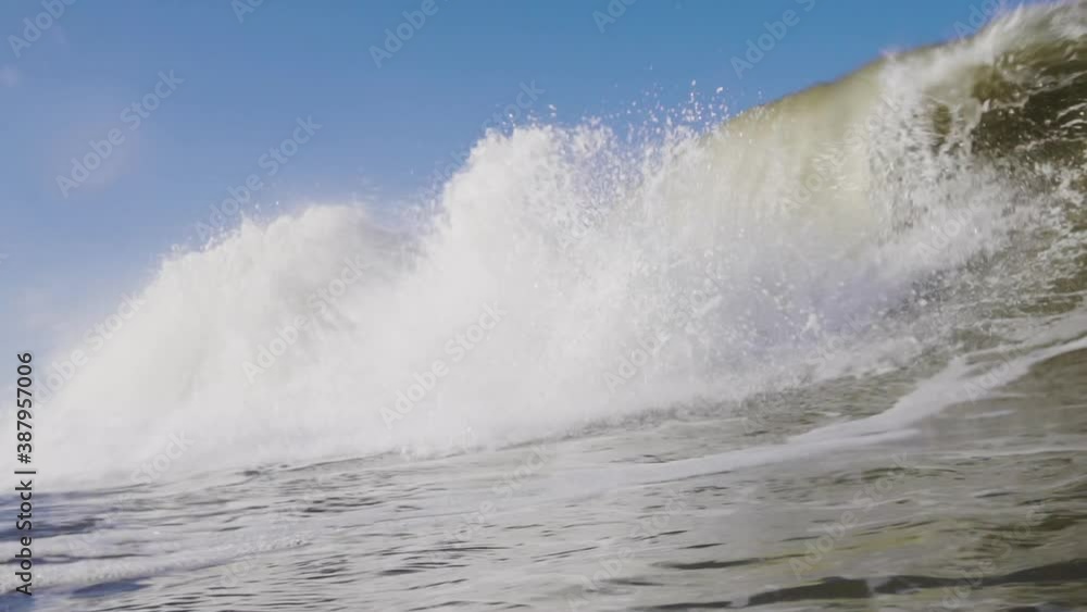 Cinematic underwater slow motion shot of a beautiful wave breaking on the coast of the Netherlands 4K Cinematic underwater slow motion shot of a beautiful wave breaking on the coast of the Netherlands 4K