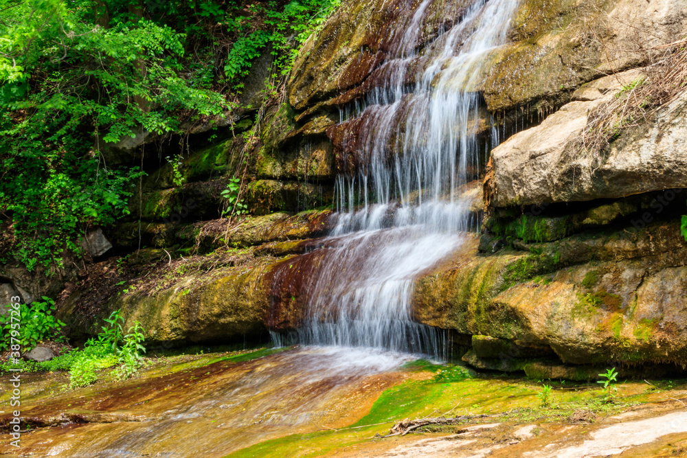 Naklejka premium Beautiful waterfall in Sofiyivka park in Uman, Ukraine