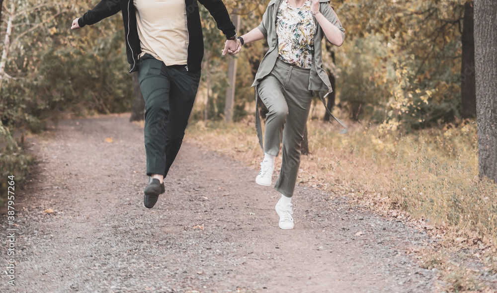Fototapeta premium young couple lovers jump and fly, having fun, happy life