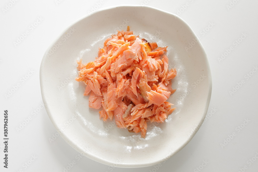 Japanese food, grilled salmon flake on dish with copy space Japanese food, grilled salmon flake on dish with copy space