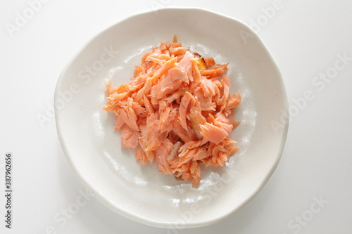 Japanese food, grilled salmon flake on dish with copy space