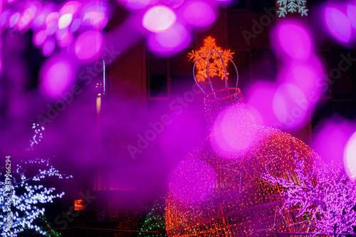 Bright Christmas decorations on urban trees.Decoration of the city