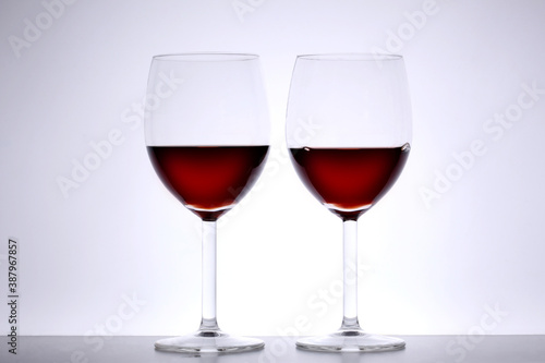 two wine glasses on white background with copy space for your text