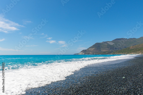 Nonza Beach in Corsica under a great blue sky