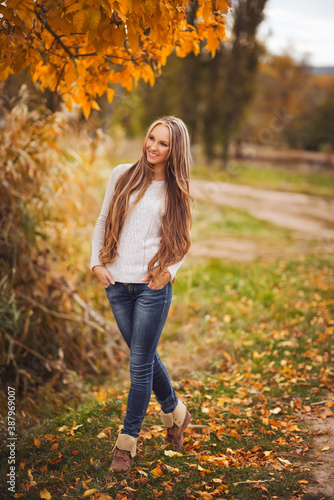 young girl in autumn park © strekozza77