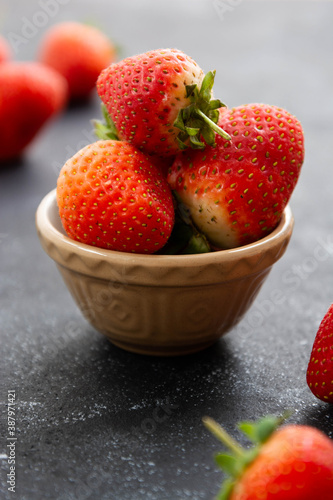 Fresh strawberry fruits in a bowl. Delicious fruits.