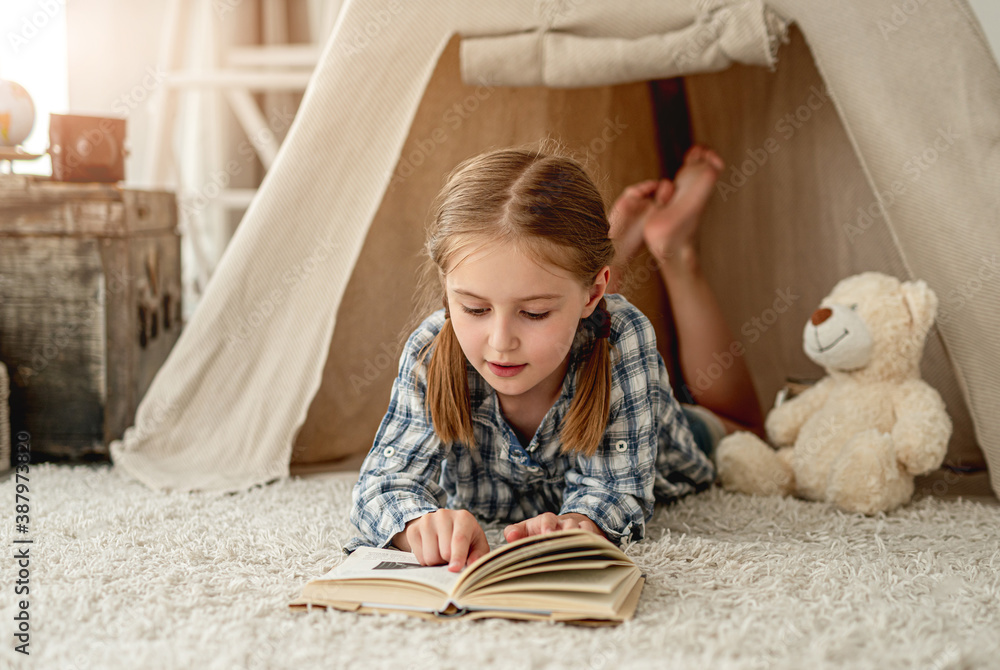 Nice little girl with paper book Nice little girl with paper book