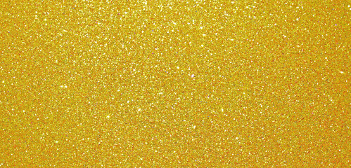 Christmas gold glitter background, golden shiny glittering shimmer pattern. Glittery sequins and gold foil confetti shine backdrop, Xmas card shimmer and luxury tinsel, gleam light effect background