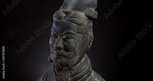 head of terracotta warrior on black background photo