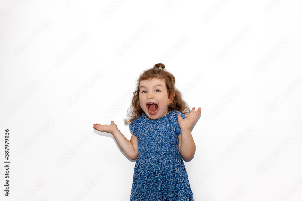 Close up studio portrait of adorable young kid girl laughing with excitement, happy jump, isolated on white backgroud. Human emotions and facial expressions concept. Copy space Close up studio portrait of adorable young kid girl laughing with excitement, happy jump, isolated on white backgroud. Human emotions and facial expressions concept. Copy space
