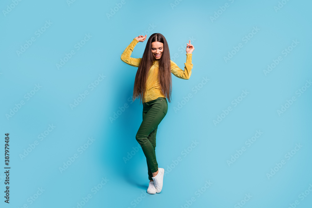 Photo portrait full body view of woman dancing isolated on pastel blue colored background