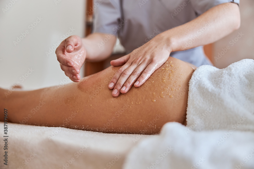 Young atractive female in massage salon is having beauty and healthcare procedures Young atractive female in massage salon is having beauty and healthcare procedures