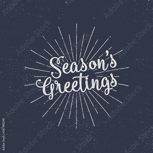 Merry Christmas lettering. Season s greetings. Holiday typography . Letters composition with sun bursts and halftone texture. Use as photo overlay  place to cards  print on t shirt  tee design