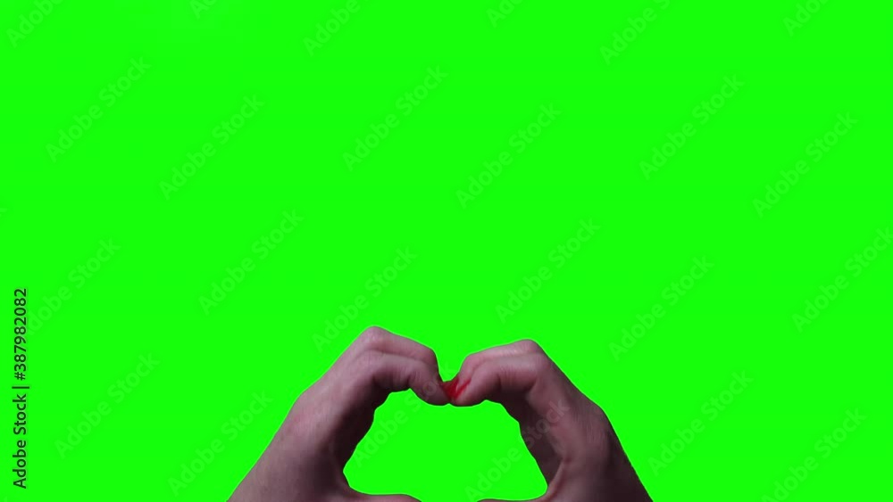 4k female hand making heart shape gesture isolated on green screen chromakey background. Person forms a heart shape using their fingers. Two handed gestures. Chromakey. Green Screen. Love and Valentin 4k female hand making heart shape gesture isolated on green screen chromakey background. Person forms a heart shape using their fingers. Two handed gestures. Chromakey. Green Screen. Love and Valentin