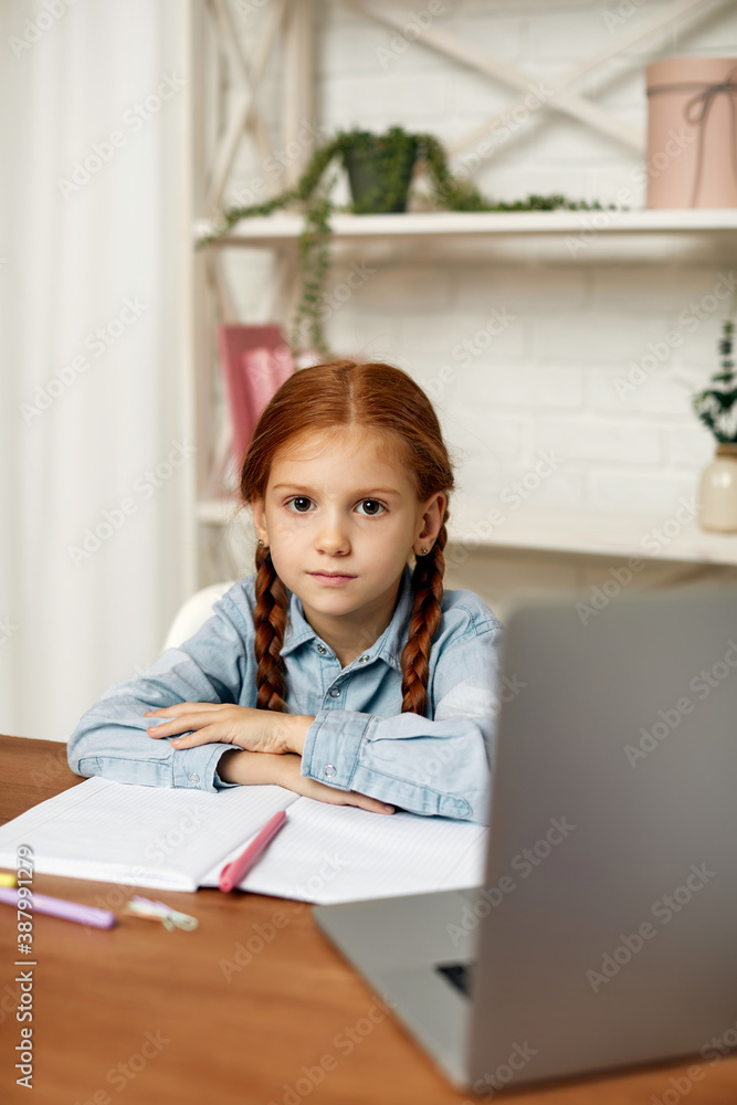 little child girl using laptop for studying online learning system. online education concept little child girl using laptop for studying online learning system. online education concept