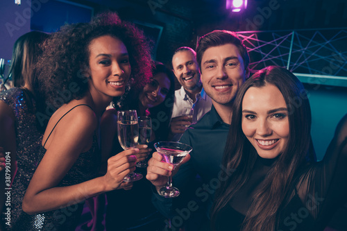 Photography Photo portrait of girl taking selfie with friends at party drinking together cha
