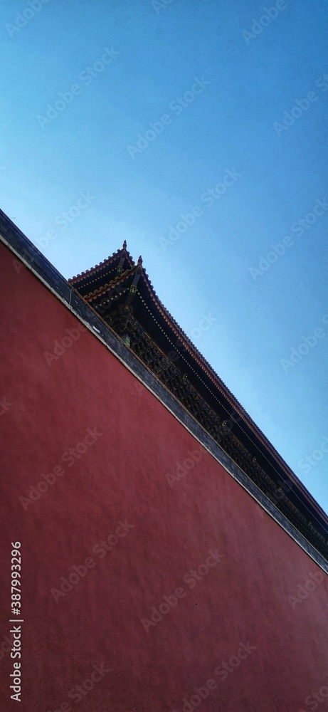 roof of Forbidden Palace and blue sky in sunny autumn day