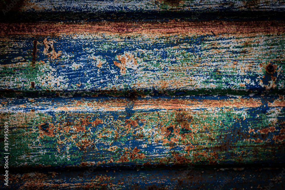 Old rusty blue fence made of metal