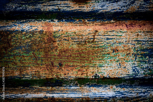 Rusty spot on a metal fence