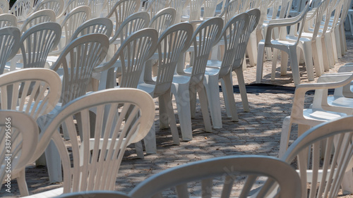 A lot of plastic chairs prepared for public holyday at city square.