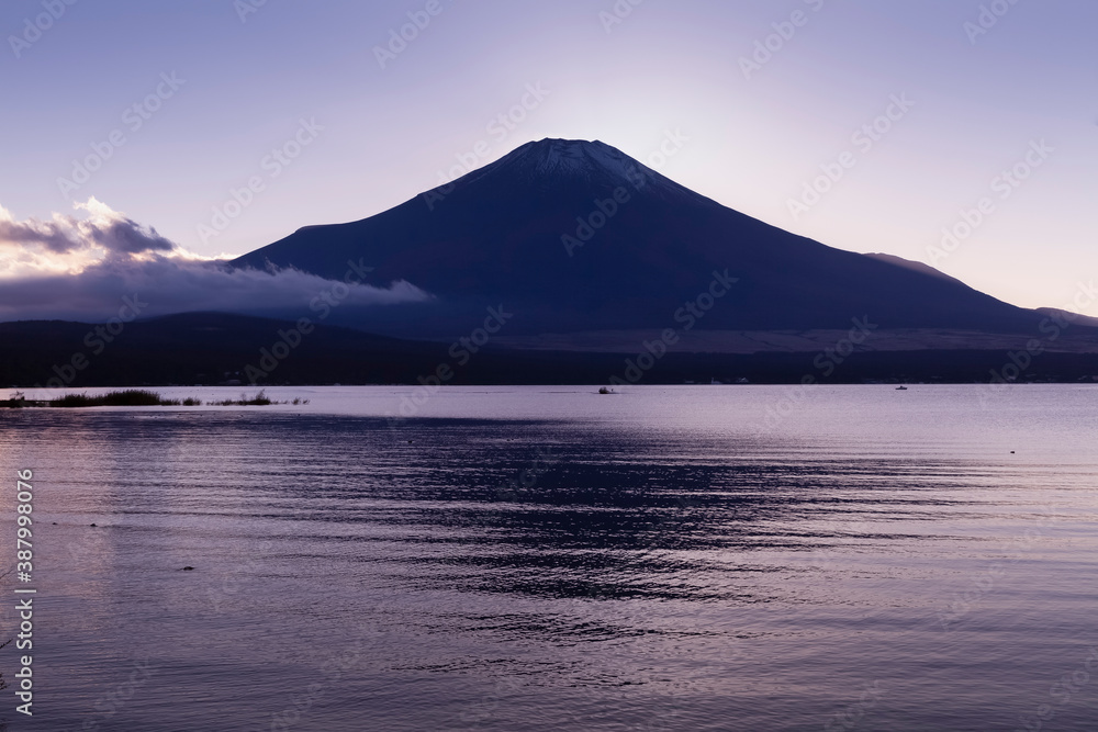 Calm atmosphere in the evening, Mount Fuji and Lake Yamanaka after sunset in autumn color