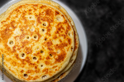 A stack of fresh and flavorful pancakes.