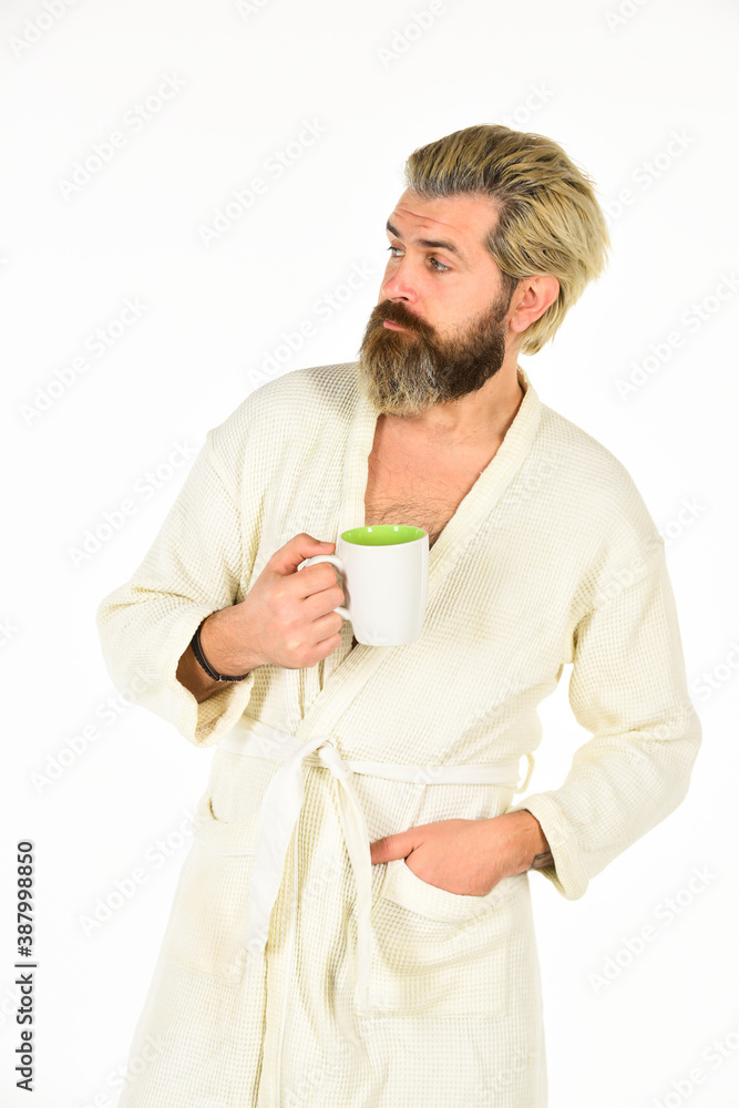Enjoying morning coffee. man in bathrobe drink coffee at luxury hotel in morning. man drink tea relaxing in bathrobe. man in bathrobe after shower drinking coffee from cup. perfect and happy morning Enjoying morning coffee. man in bathrobe drink coffee at luxury hotel in morning. man drink tea relaxing in bathrobe. man in bathrobe after shower drinking coffee from cup. perfect and happy morning