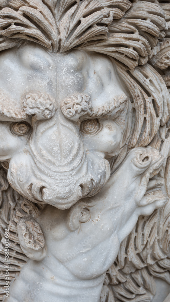 Ancient figure of a fearful lion killing a zebra in Rome, Italy, closeup, details. Ancient figure of a fearful lion killing a zebra in Rome, Italy, closeup, details.