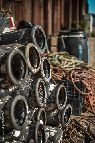 TRADITIONAL OCTOPUS WOODEN  FISHERMAN HOUSE WITH NETWORKS AND FISHING UTENSILS, IN SANTA LUZIA, PORTUGAL photo