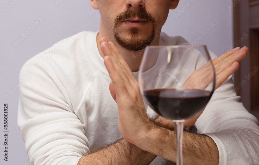 Man refuses to drink wine Man refuses to drink wine