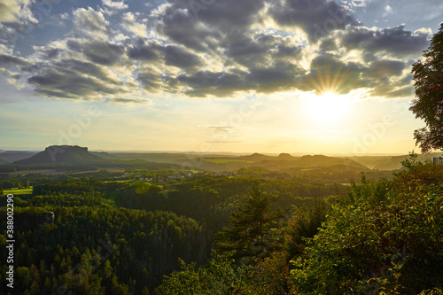 Saxon Switzerland. View at sunset from area  Brand  to landmark  Lilienstein .