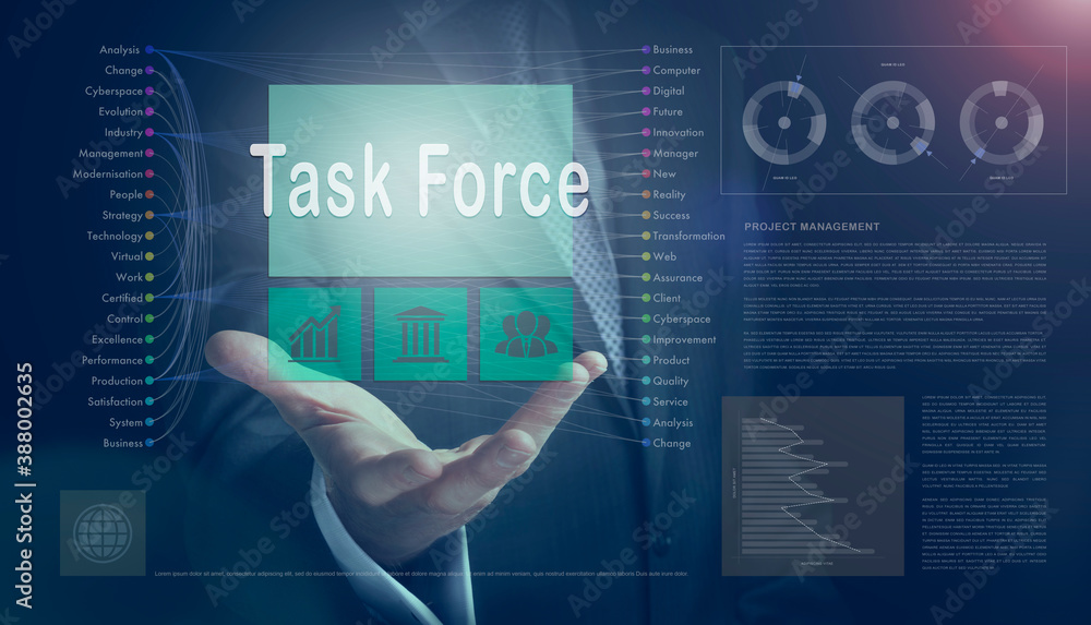 Businessman outreached hand holding a Task Force business concept on a computerised screen display.