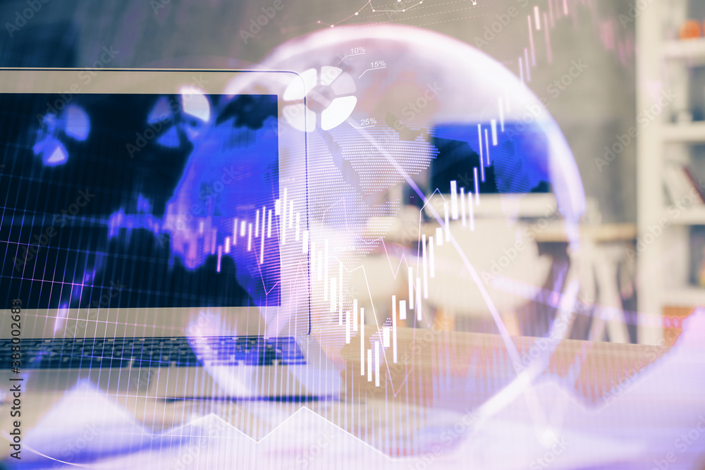 Stock market graph and table with computer background. Double exposure. Concept of financial analysis. Stock market graph and table with computer background. Double exposure. Concept of financial analysis.