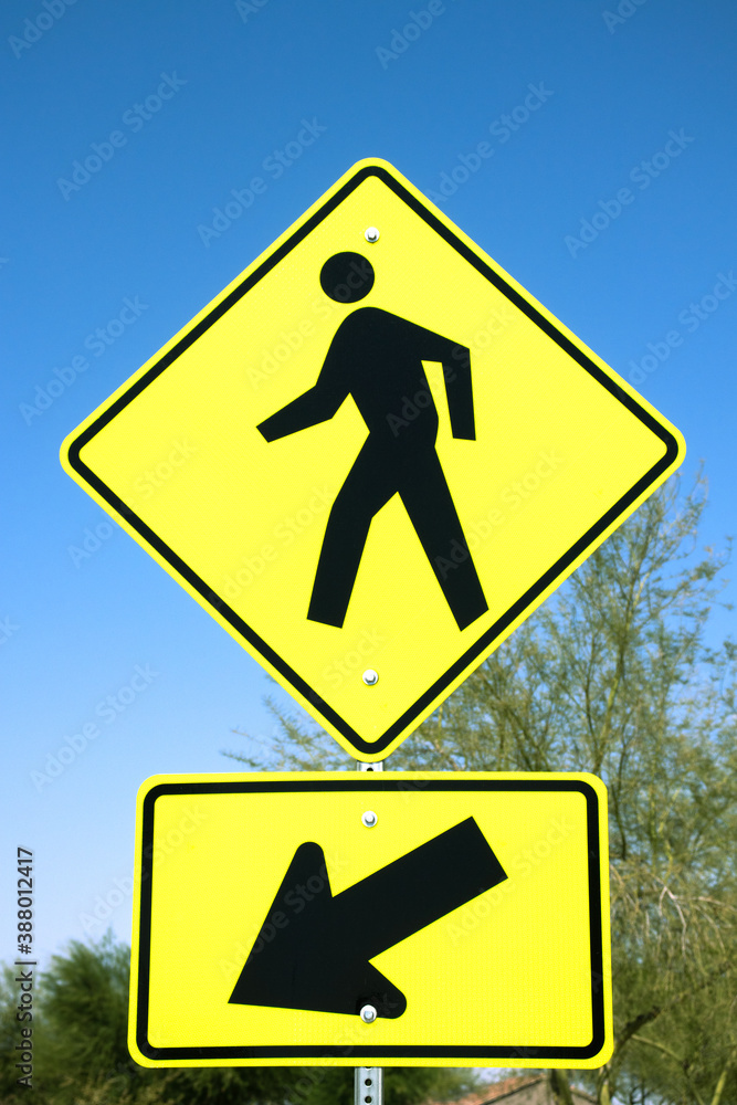Yellow caution pedestrian walkway with arrow Yellow caution pedestrian walkway with arrow