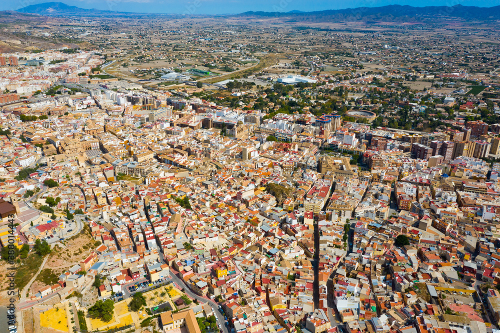 General aerial view of Lorca cityscape on sunny fall day, Murcia, Spain..