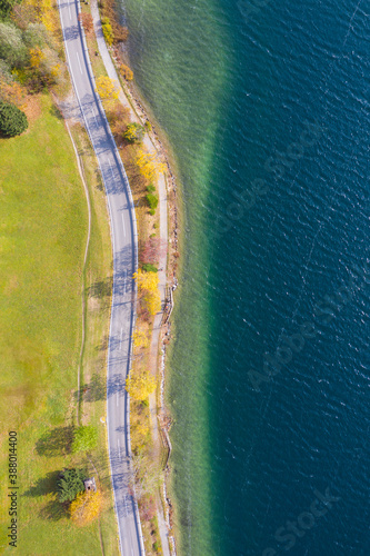 Aerial picture from above of street and lake promenade Haldensee in autumn photo